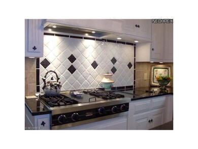Custom cabinetry, granite counters, and wonderful 