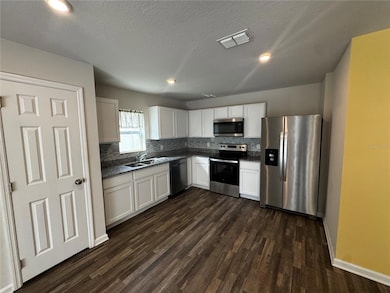 1721 Nebraska Loop, Bushnell, FL 33513 - photo 4