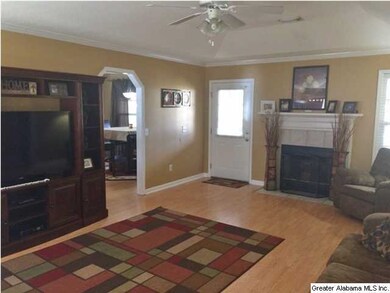 The living room has a lot of room for a large fami