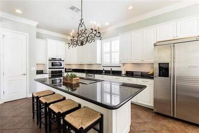 Kitchen with crown molding, GE Monogram appliances