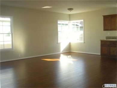 BIG LIVING ROOM WITH NEW LAMINATE FLOORING