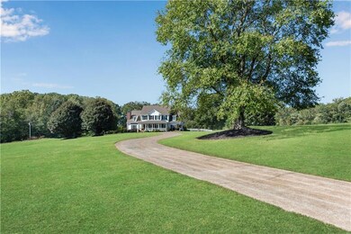 Lovely driveway to this beautiful home