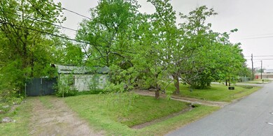 This property features a modest, weathered structu