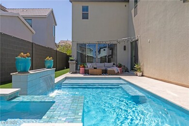 Quartz plastered pool with raised hot tub, fire fe