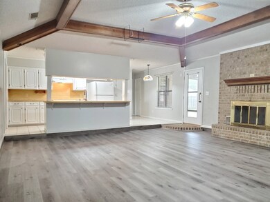 Living room & kitchen view w new flooring