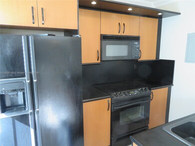 Contemporary cabinets and lighting in kitchen