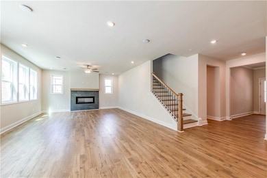 Unfurnished living room with a premium fireplace, 