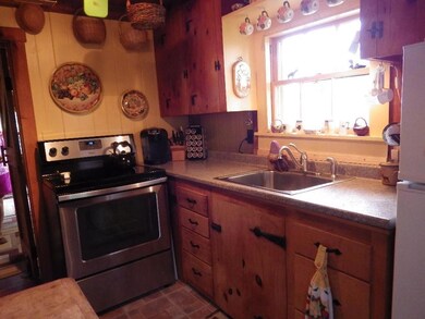 Country kitchen over looking waterfront.