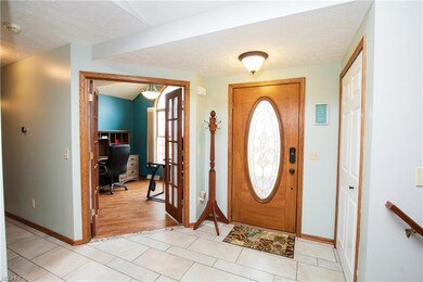 Foyer area....ceramic flooring with decorative tri