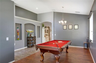 Formal Living and Dining Rooms w/ wood floors and 