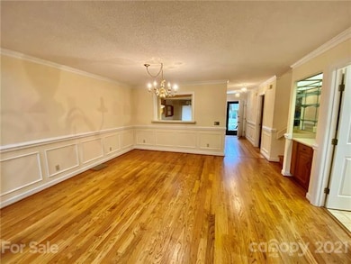 Dining Area with Pass Through to Kitchen