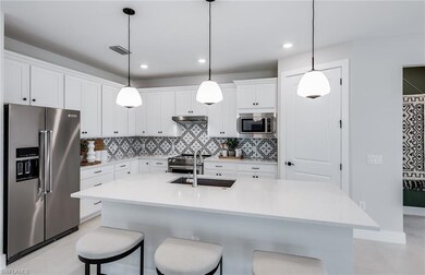 Interior photos are of a staged model home. Illust