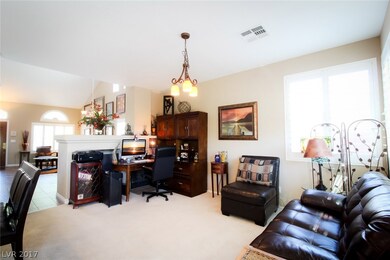 Den right off kitchen.  Fire place is behind compu