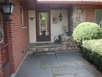 Exterior Front Slate entry way and custom stone accents