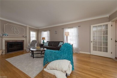 The Living Room with hardwood floor and marble sur