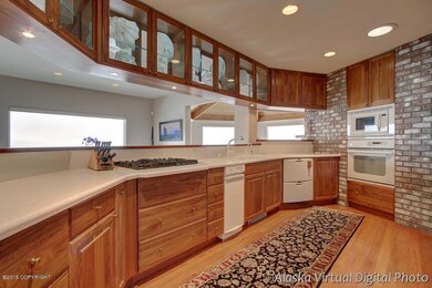 Custom walnut kitchen w/hardwood floors