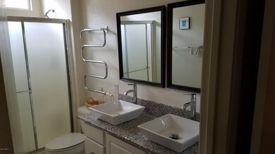 Granite dbl vanity w/vessel sinks in MB