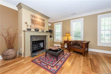 Living Room with brand new tile fireplace surround