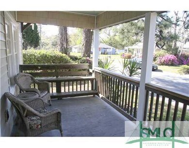 Porch. Classic deep front porch for evening wind-d