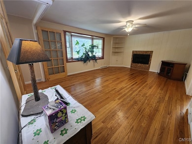 gas log fireplace and built in corner hutch