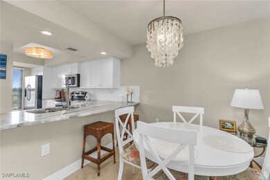 Kitchen featuring stainless steel appliances, whit