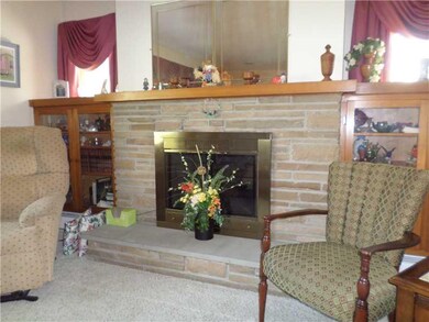 Living Room. Gas log fireplace to stay warm & cozy