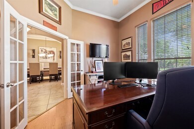 Beautiful glass french doors + upgraded flooring!