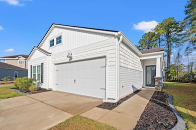 Exterior space with concrete driveway