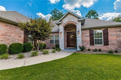 A warm approach to the covered porch and handsome entry door.