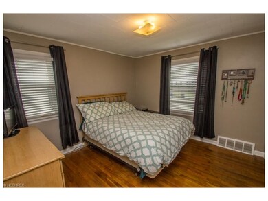 Master BR with hardwood floors.