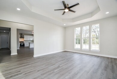 The living room overlooks the kitchen