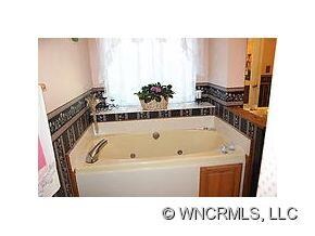 Jet tub with seperate shower