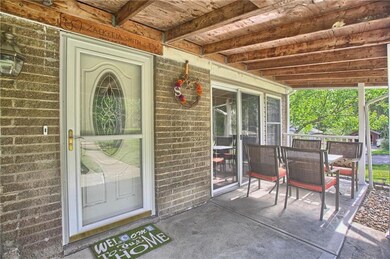 Charming front porch area to enjoy during the summ