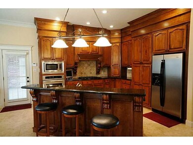 Kitchen. Island kitchen w/stainless steel microwav