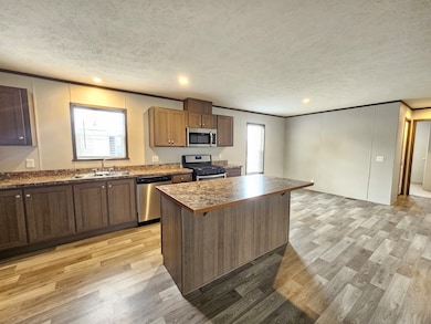 78 Elm unit 78, Highland, MI 48357 - photo 2