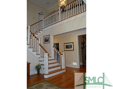 Other. A wide entry hall with winding staircase an
