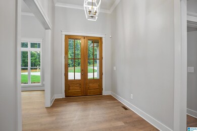 14'+- ceilings in the foyer and dining room.