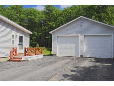 Exterior Front. 2 car garage