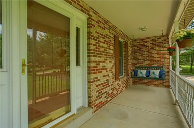 Enjoy your morning coffee on the porch swing!