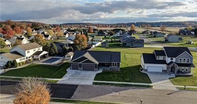 913 Zerelda St NW, Strasburg, OH 44680 - photo 2