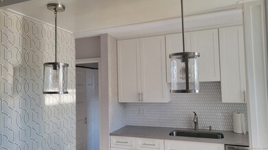 Pendant lighting over breakfast bar