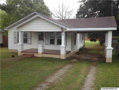 Drive through Carport...entry to beautiful backyard