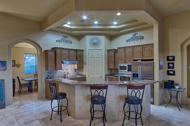Kitchen with bar and pantry