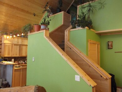 Staircase to lofted bedroom
