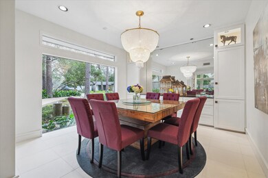 Elegant formal dining room with large picture wind