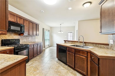 Kitchen: Tile Flooring - Recessed Lighting - Plenty of Cabinets for Storage - Open to Dining & Great Room