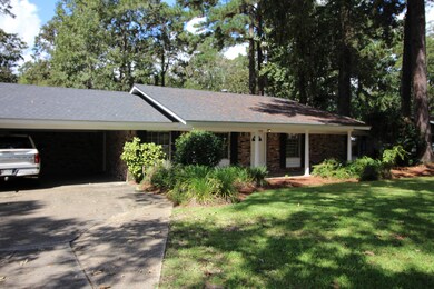 Covered porch, attached carport