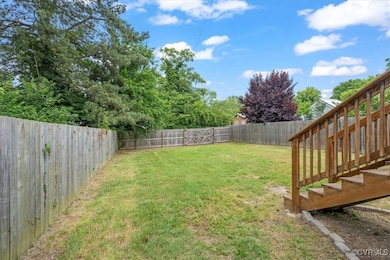 View of fenced backyard