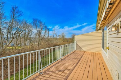 Deck with treeline views. Motorized awning. Plenty