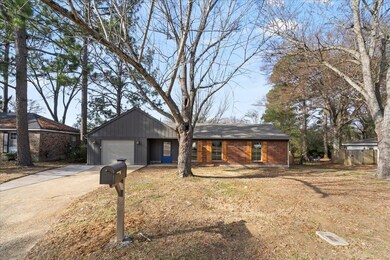 Single story home with a garage